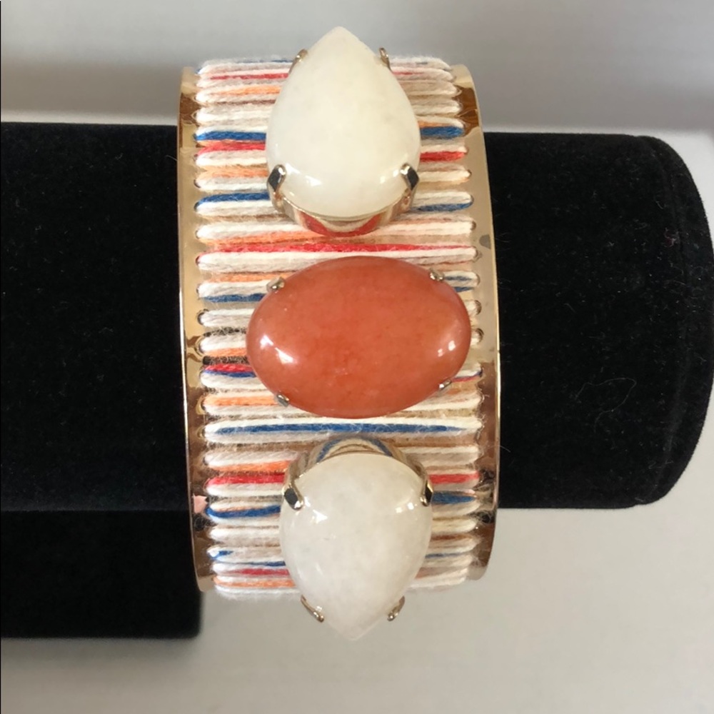 Chico’s multi color thread bracelet on gold.